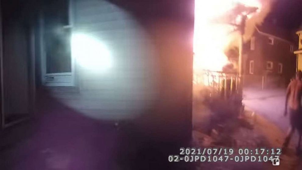 PHOTO: A cop is being hailed as a hero after footage from his body camera showed him responding to a building engulfed in flames before saving the occupants’ lives by catching them when they jumped out of a window on July 19, 2021, in Jamestown, New York.