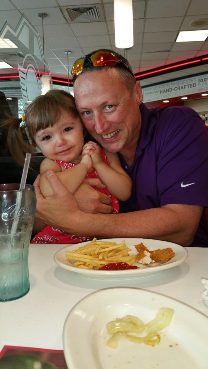 PHOTO: Braelyn Dalsing is pictured with her adoptive father Ed Dalsing.
