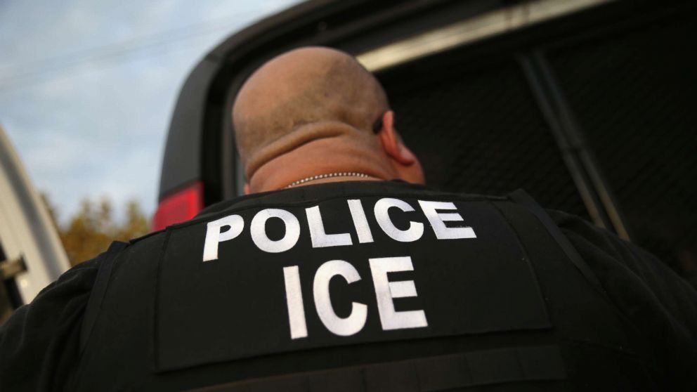 U.S. Immigration and Customs Enforcement (ICE), agents detain an immigrant on in Los Angeles, on Oct. 14, 2015.