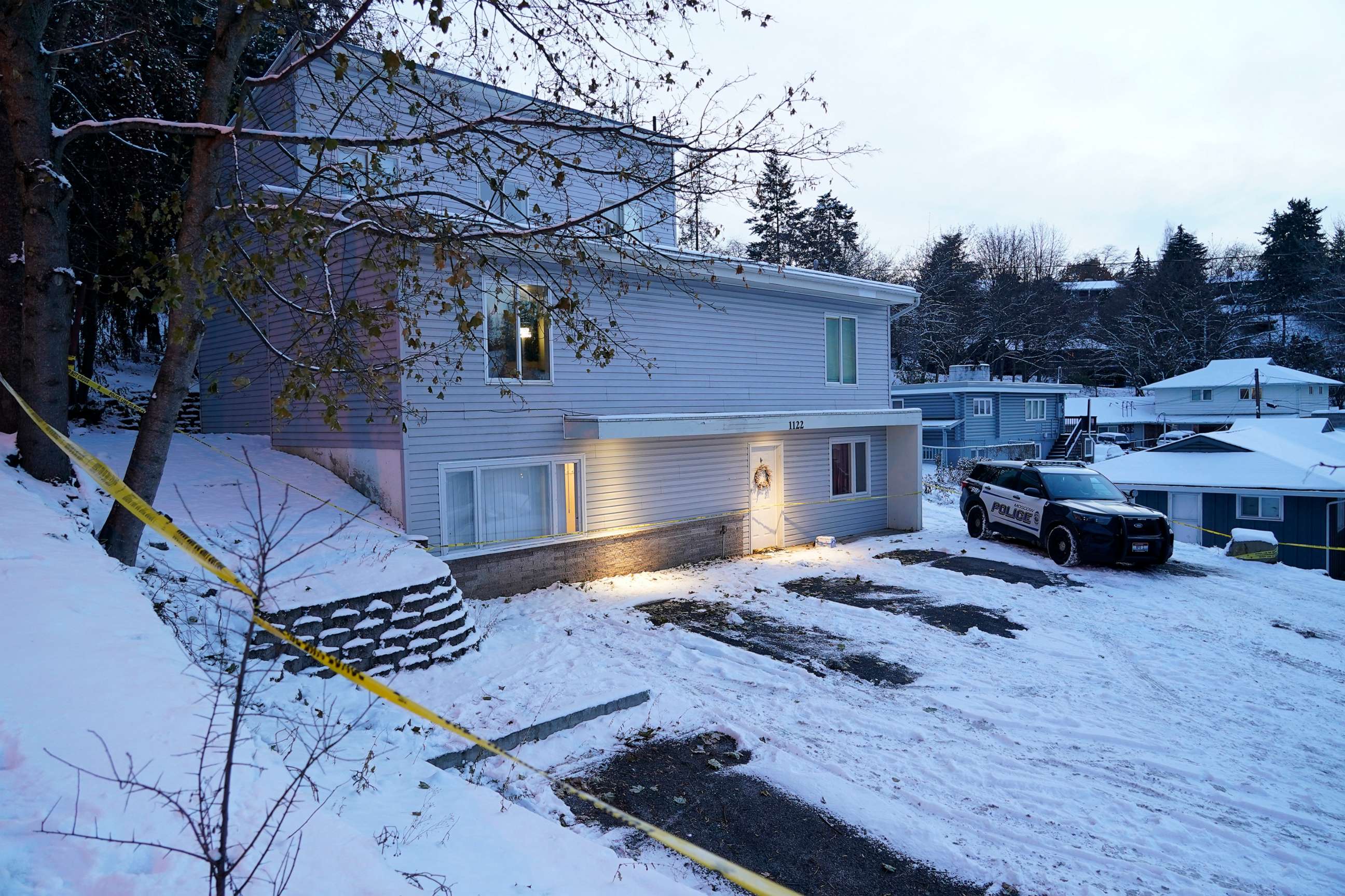 PHOTO: Bare spots are seen, Nov. 29, 2022, in the snowy parking lot in front of the home where four University of Idaho students were found dead on Nov. 13, in Moscow, Idaho.