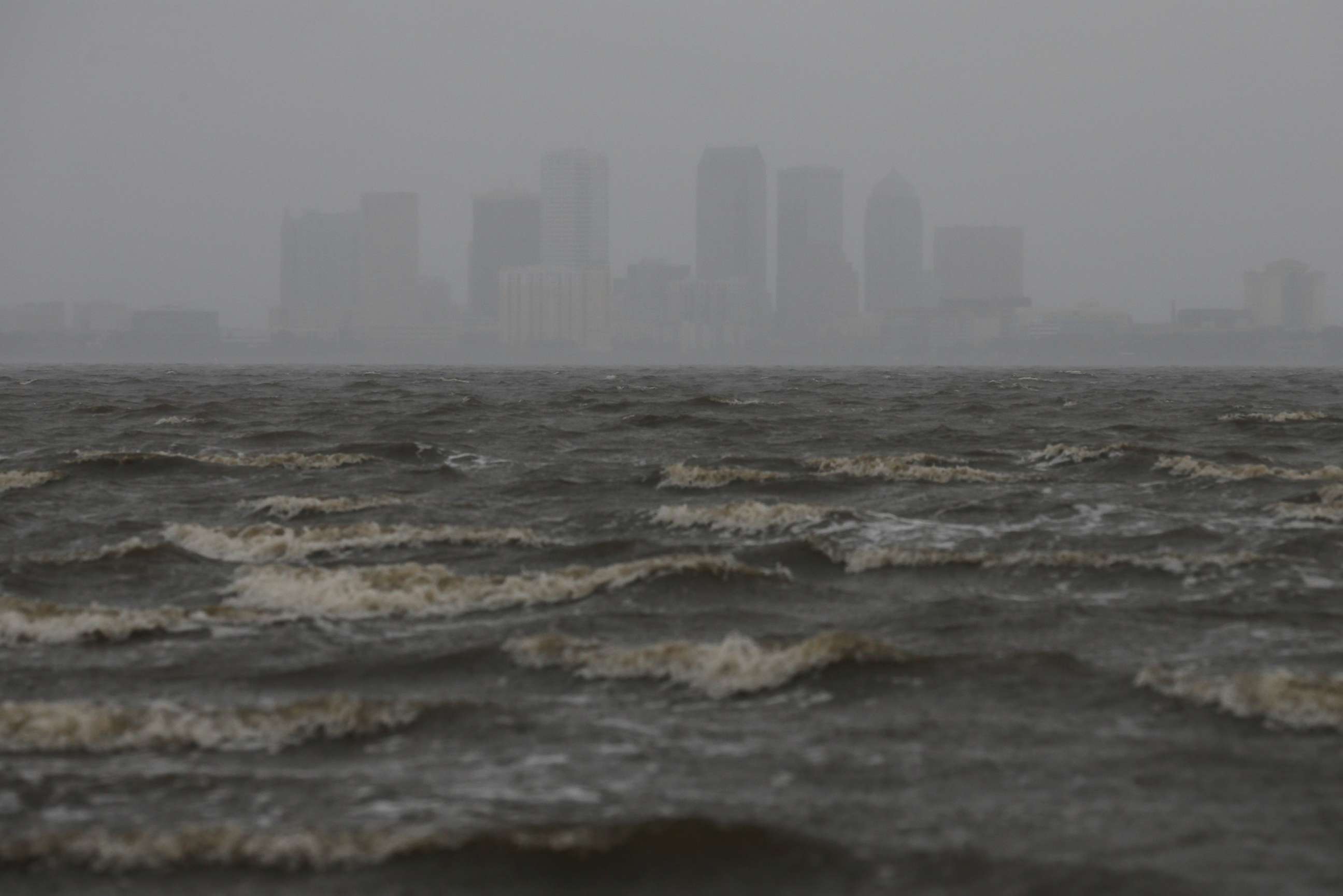 PHOTO: The Tampa skyline is pictured across Hillsborough Bay ahead of the arrival of Hurricane Irma in Tampa, Fla., Sept. 10, 2017. 