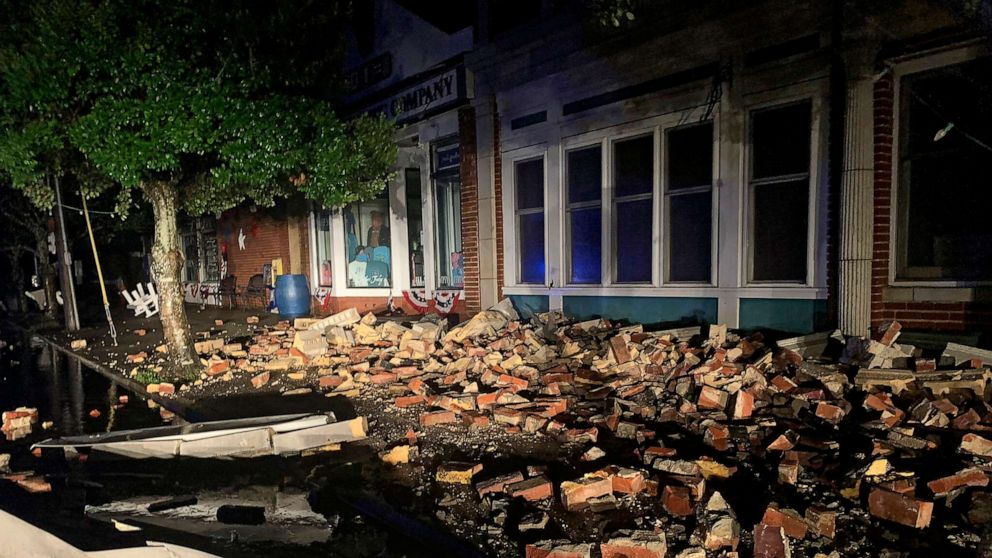 PHOTO: Debris covers the sidewalk in Southport, N.C. on Aug. 4, 2020.