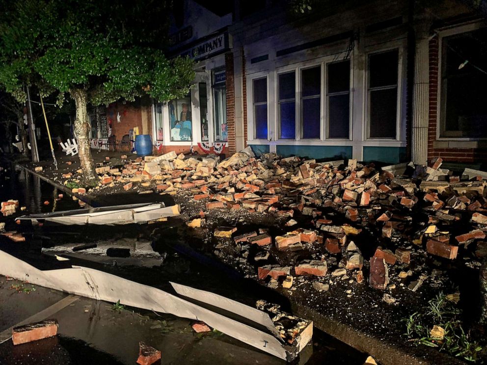 PHOTO: Debris covers the sidewalk in Southport, N.C. on Aug. 4, 2020.