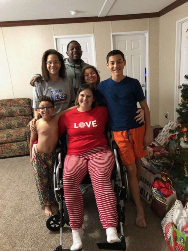 PHOTO: Navy veteran Jessica Pickett pictured with her family. She was shot nine times on Dec. 6, 2019.