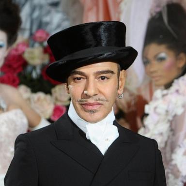 PHOTO: Fashion designer John Galliano poses at the end of the presentation of the Dior Haute Couture spring/summer 2010 fashion collection, Jan. 25, 2010, in Paris.