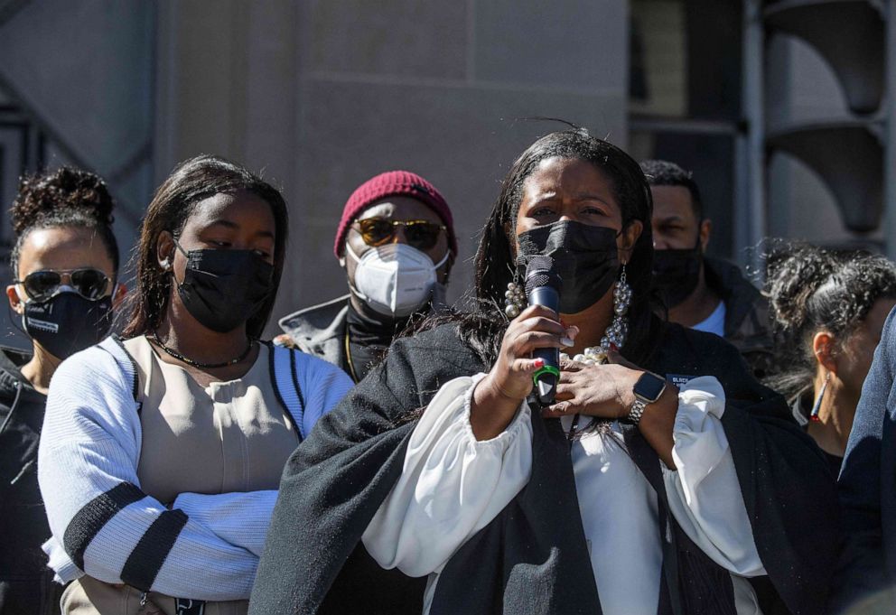 PHOTO: Deena Joseph (C), mother of Andrew Joseph III, speaks during a rally against "qualified immunity" at the Justice Department in Washington, D.C., March 3, 2022. 