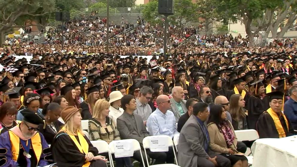 PHOTO: Students and family members at the 2016 commencement ceremonies of Cal State Long Beach.  Seated in the front row was the mother of Nohemi Gonzalez and her partner who were there to receive her degree posthumously