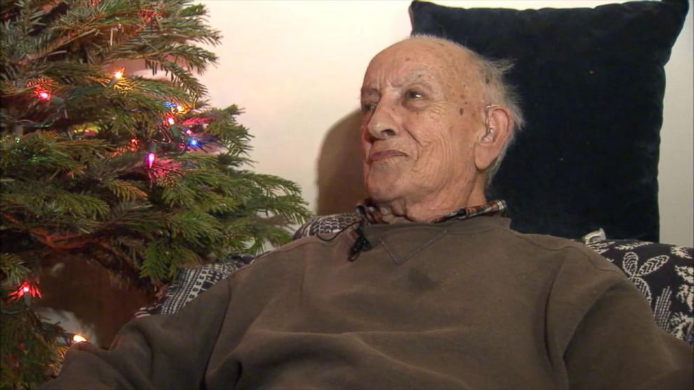 Los Angeles Police Department officers surprised 94-year-old World War II veteran Herman Perry with a Christmas tree, lights and presents on Dec. 21, 2015.