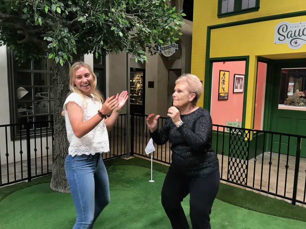 PHOTO: Karly King dances with her grandmother Jacki Dwyer-Taylor at Town Square.