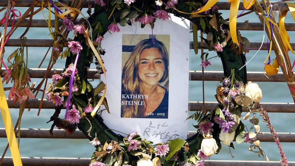 PHOTO: Flowers and a portrait of Kate Steinle are displayed at a memorial site on Pier 14 on July 17, 2015, in San Francisco, Calif. 