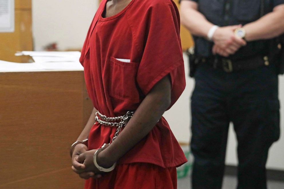 PHOTO: Dawit Kelete wears handcuffs chained to his waist as he walks into a court appearance, July 6, 2020, in Seattle. 