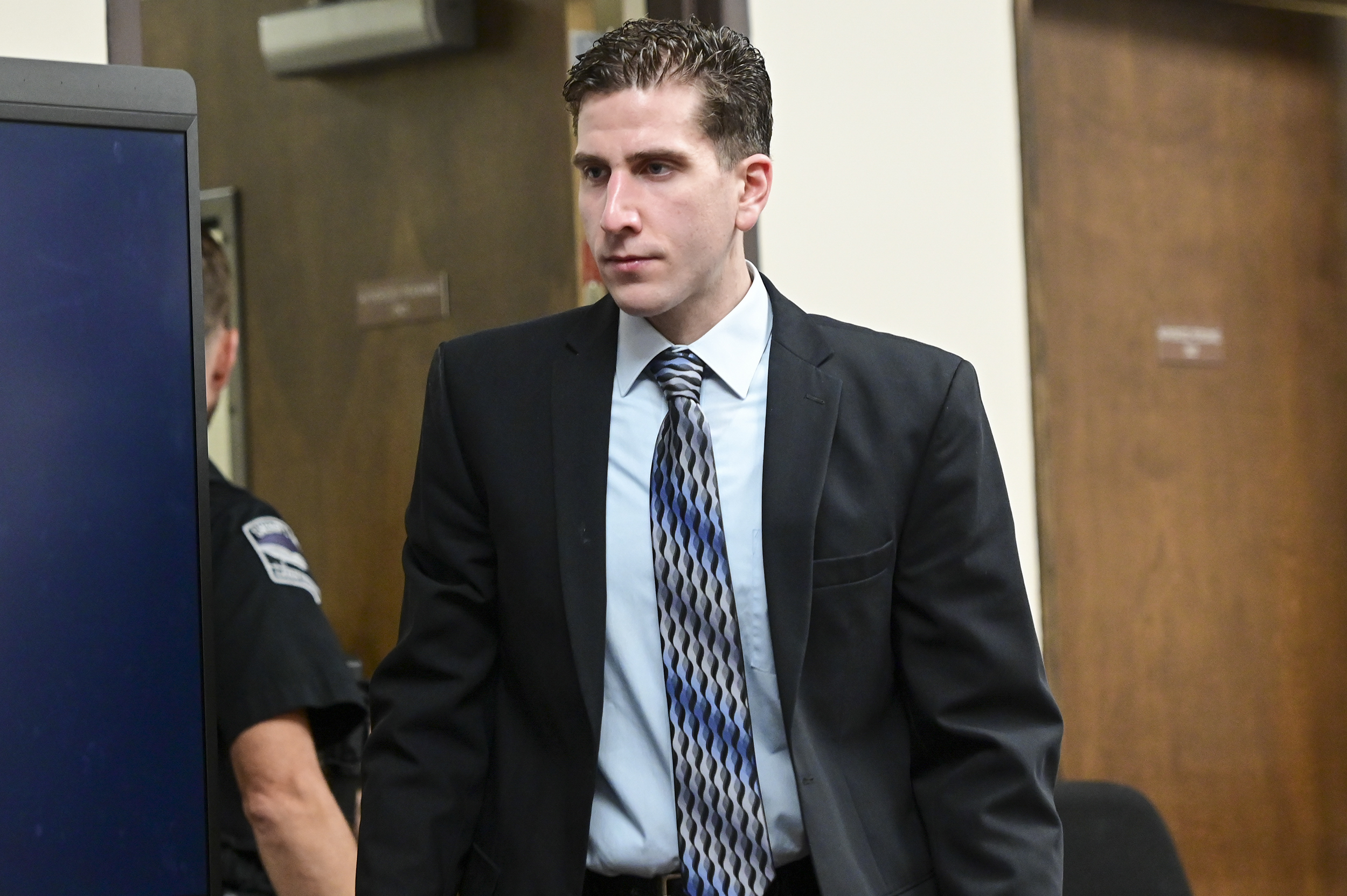 PHOTO: Bryan Kohberger enters the courtroom for a motion hearing regarding a gag order, June 9, 2023, in Latah County District Court in Moscow, Idaho.