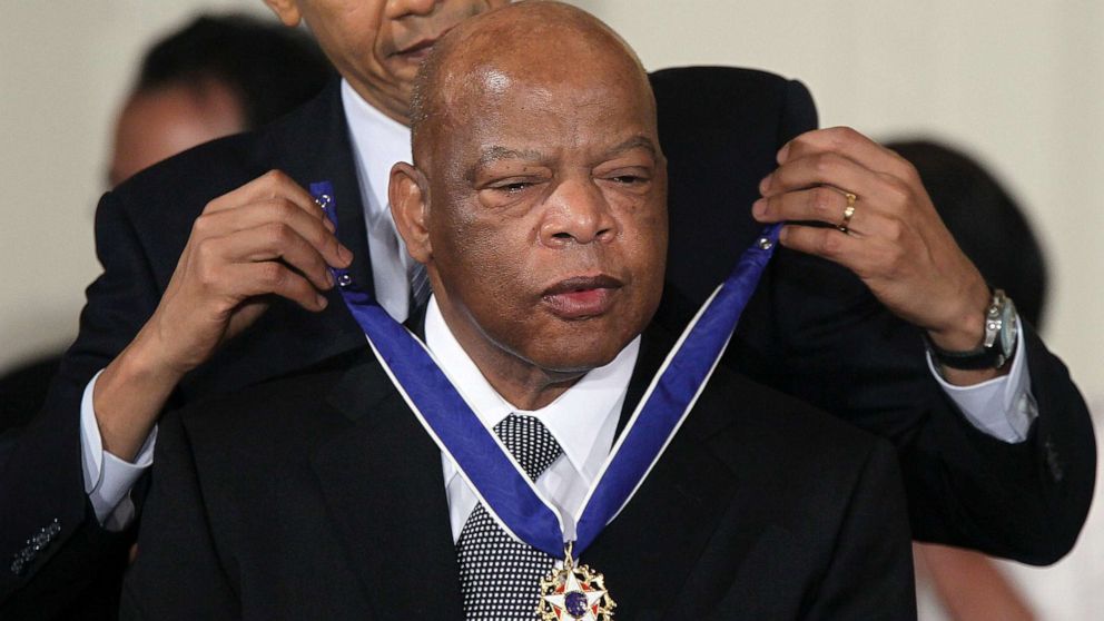 PHOTO: (FILES) In this file photo taken on February 14, 2011 U.S. Rep. John Lewis (D-GA) (R) is presented with the 2010 Medal of Freedom by President Barack Obama during an East Room event at the White House February 15, 2011 in Washington, DC.