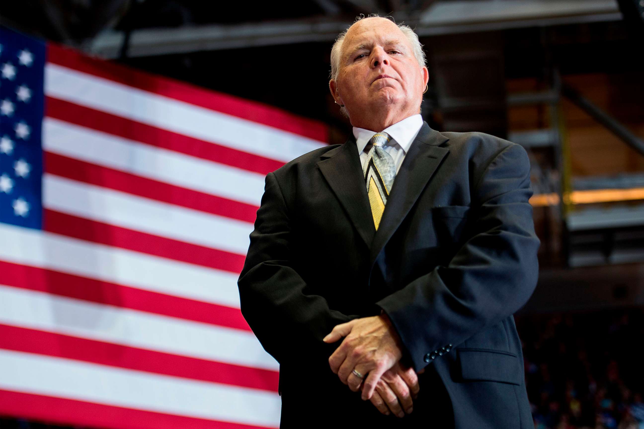 PHOTO: Rush Limbaugh looks on before introducing President Donald Trump to deliver remarks at a "Make America Great Again" rally in Cape Girardeau, Mo, Nov. 5, 2018.