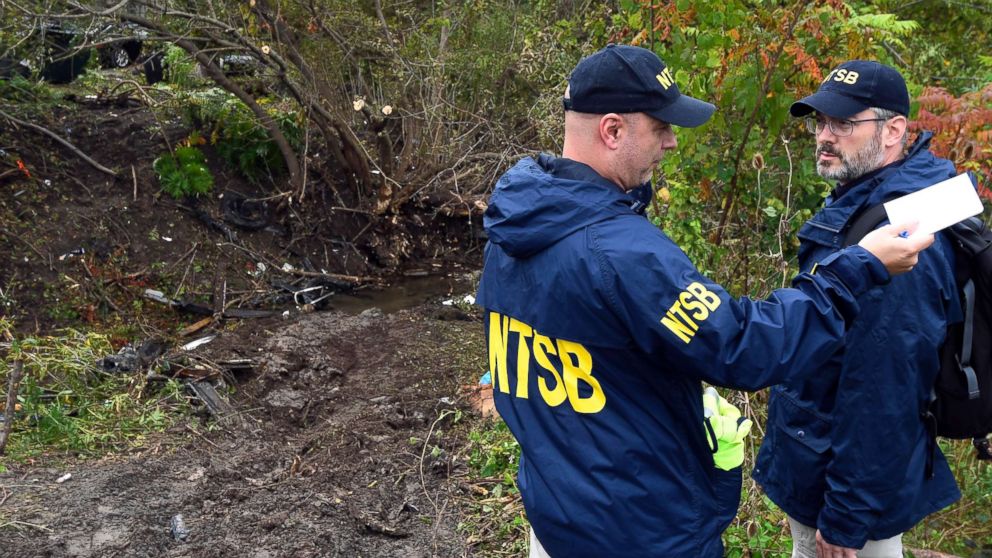 PHOTO: Members of the National Transportation Safety Board work at the scene of Saturday's fatal crash, in Schoharie, N.Y., Sunday, Oct. 7, 2018.