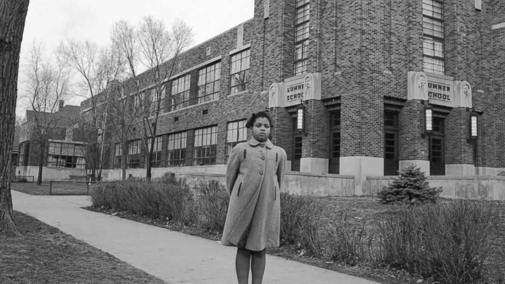 PHOTO: Nine-year-old Linda Brown poses outside Sumner Elementary School, Topkea, Kan., in 1953. 