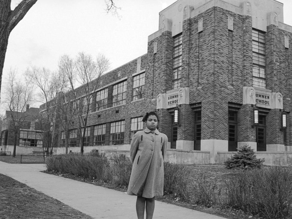 PHOTO: Nine-year-old Linda Brown poses outside Sumner Elementary School, Topkea, Kan., in 1953.