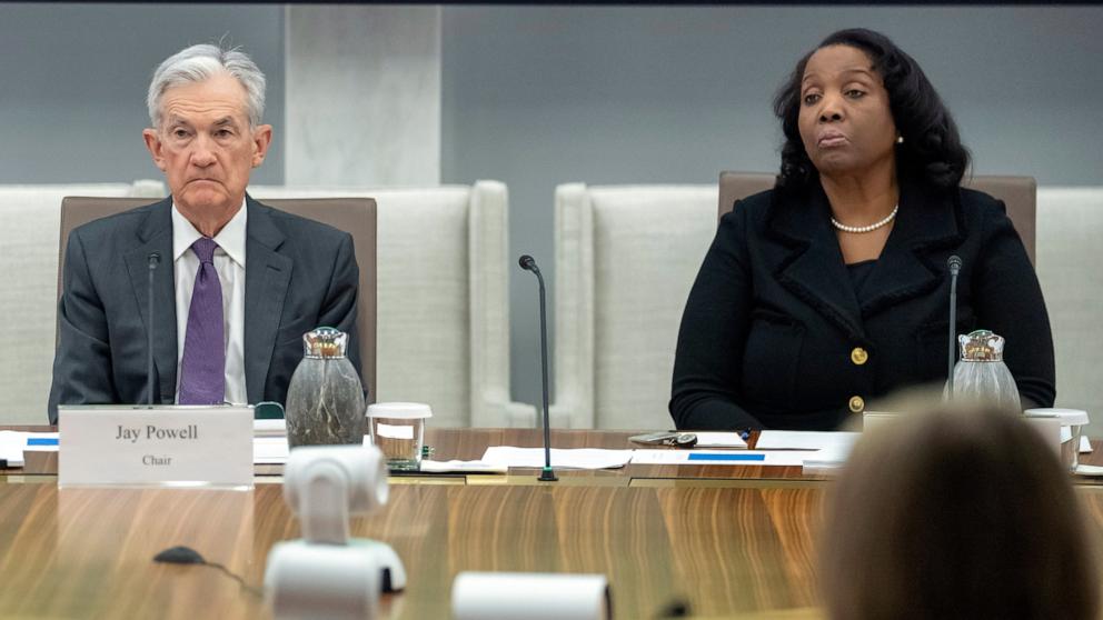 PHOTO: Federal Reserve Chairman Jerome Powell, and Board of Governors member Lisa Cook listen during an open meeting of the Board of Governors at the Federal Reserve, June 25, 2025, in Washington. 