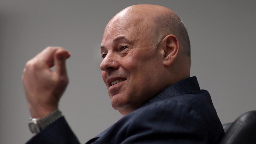 PHOTO: U.S. Postmaster General Louis DeJoy responds to a question during an interview at the U.S. Postal Service Headquarters in Washington, April 20, 2022.
