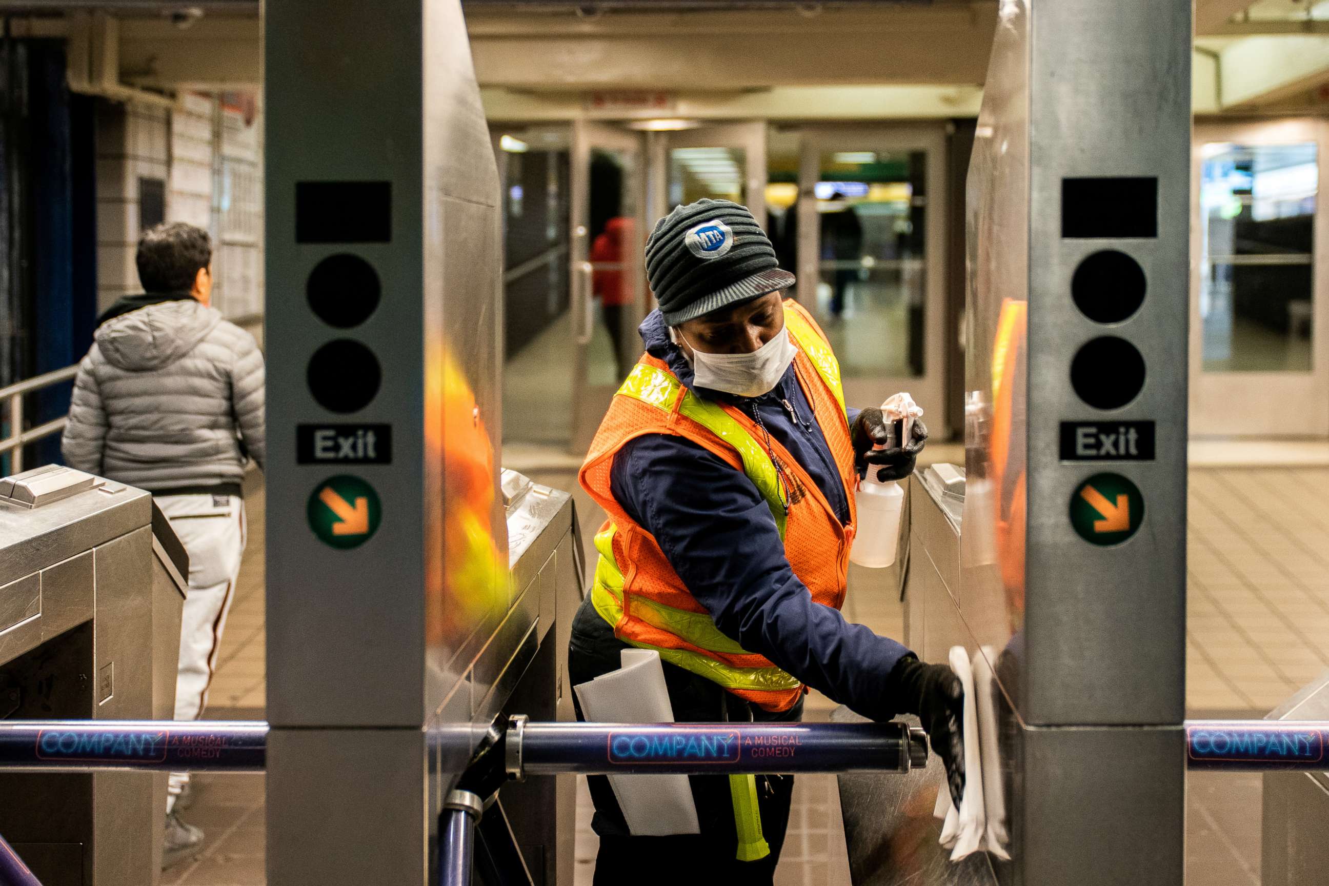 PHOTO: An MTA transit worker cleans a nearly empty Times Square-42nd Street subway station following the outbreak of novel coronavirus, in New York City, March 16, 2020. 