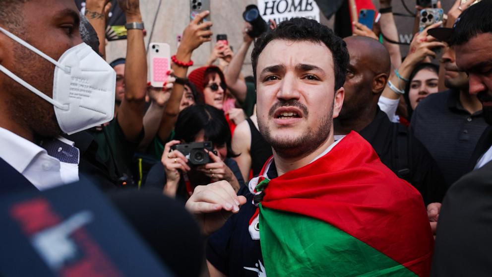 PHOTO: Palestinian activist Mahmoud Khalil marches with supporters after he was released from ICE detention during a rally outside of the Cathedral of St. John the Divine in Manhattan, June 22, 2025 in New York City. 