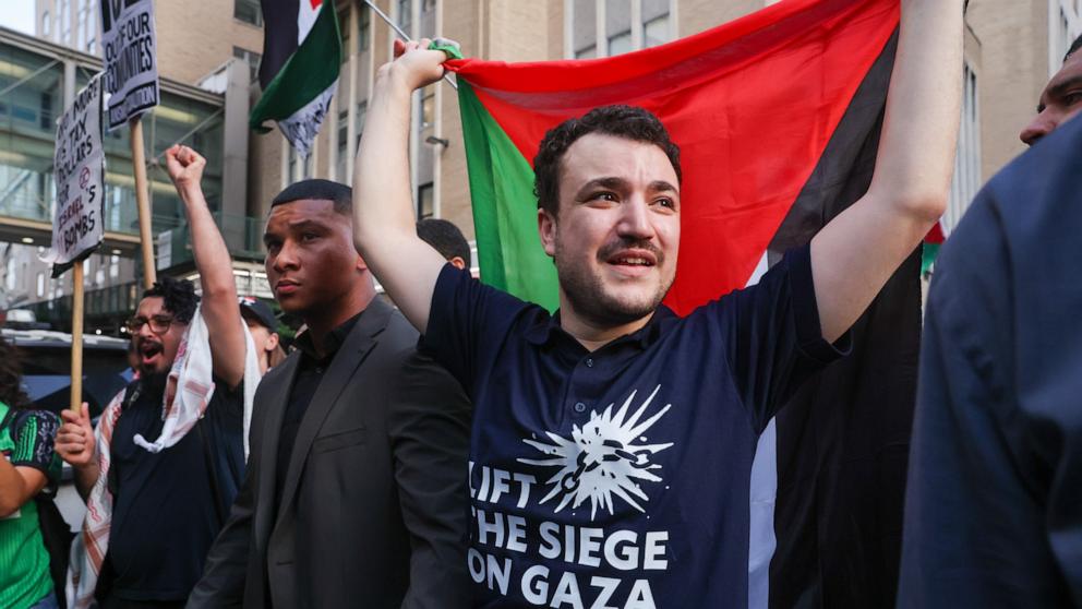 PHOTO: Palestinian activist Mahmoud Khalil marches with supporters after he was released from ICE detention during a rally outside of the Cathedral of St. John the Divine in Manhattan, June 22, 2025 in New York City.