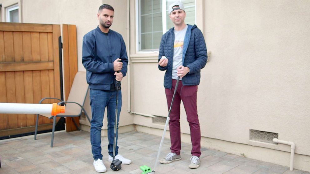 PHOTO: YouTuber Mark Rober, a former NASA engineer, shows "Nightline's" Ashan Singh the rocket-powered golf clubs he'd made for a video. 