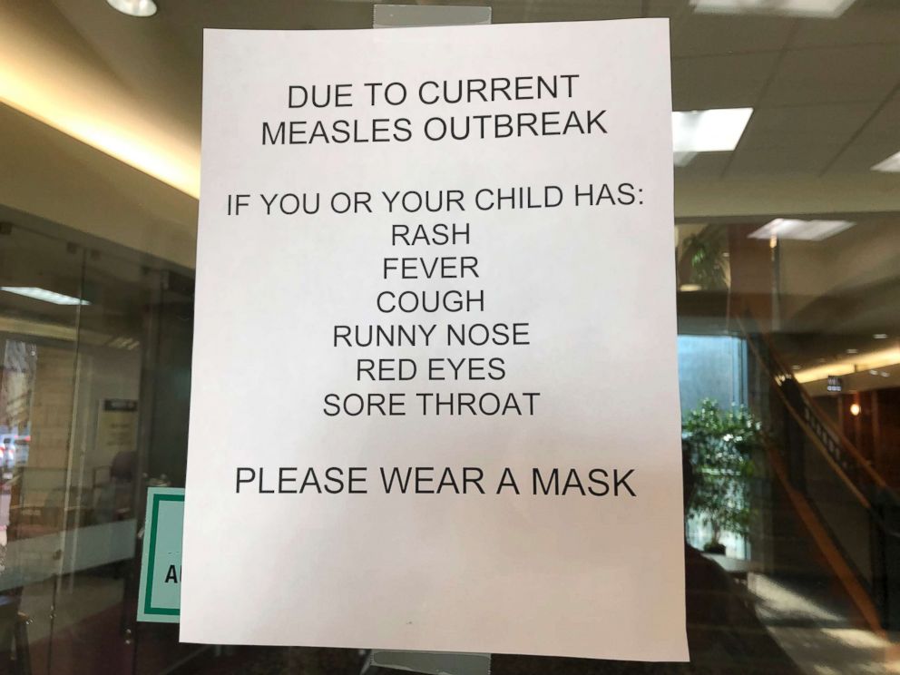 PHOTO: A sign is posted at The Vancouver Clinic in Vancouver, Wash., to warn patients and visitors of a measles outbreak, Jan. 30, 2019. 