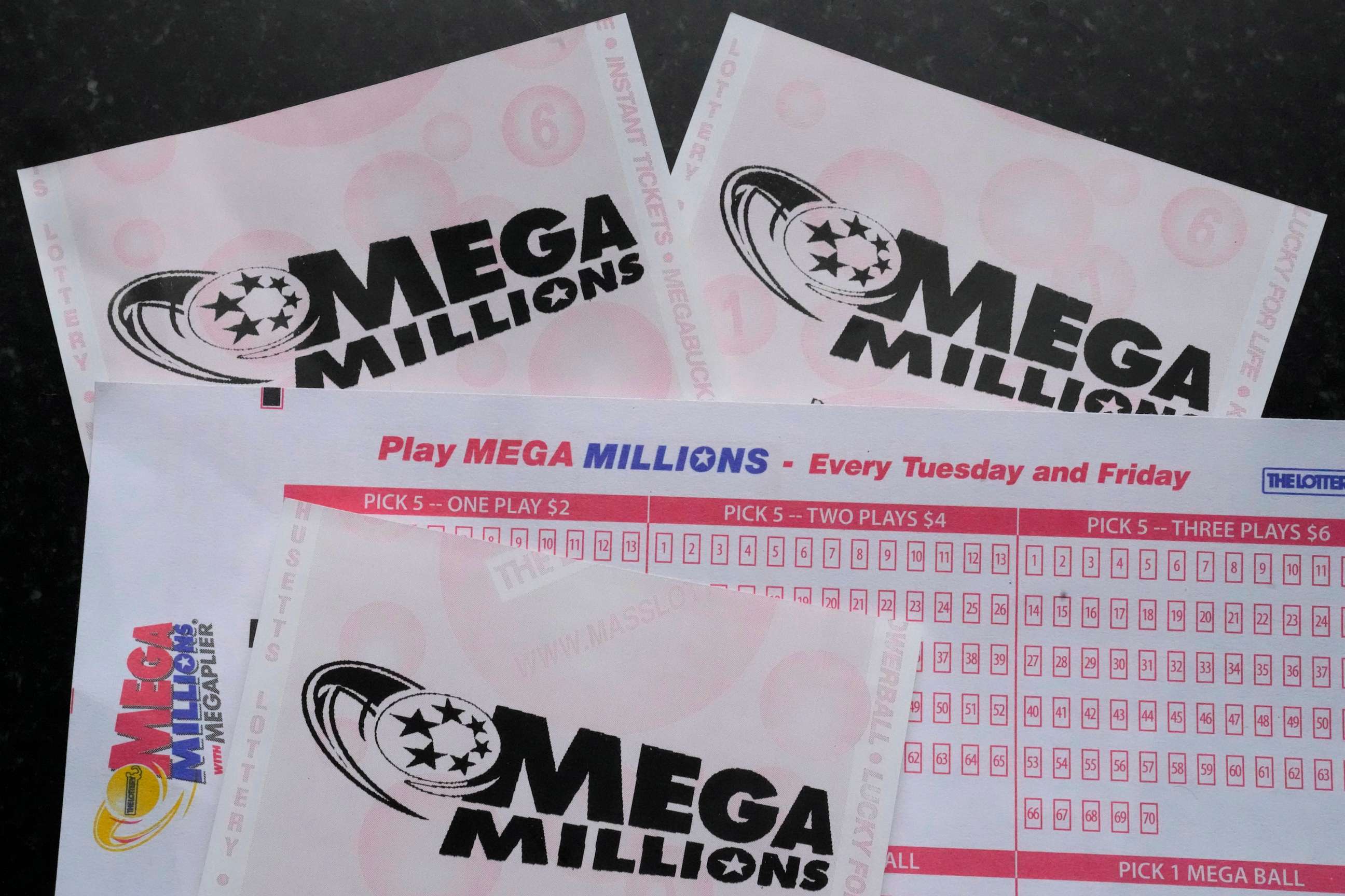 PHOTO: Mega Millions lottery tickets and a wager slip are displayed, Friday, Jan. 6, 2023, in Derry, N.H.