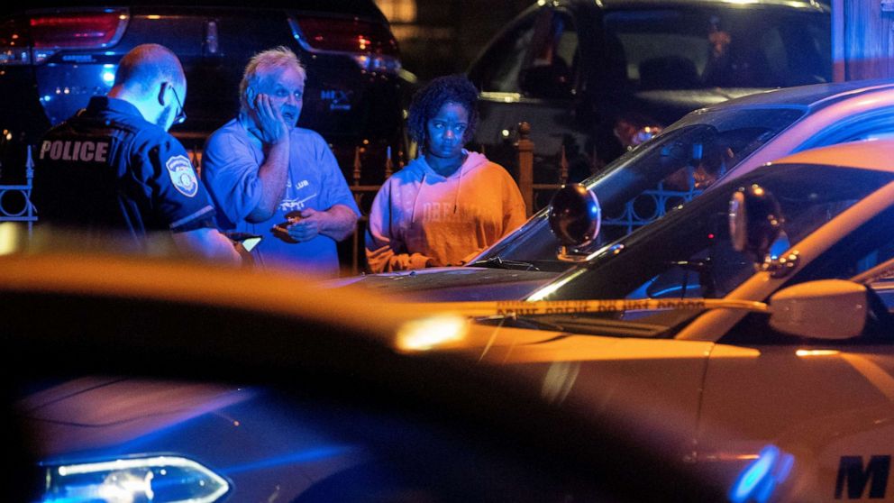 PHOTO: Memphis police officers work at one of multiple crime scenes they believe were committed by a man driving around shooting in Memphis, Tennessee, U.S. September 7, 2022. 