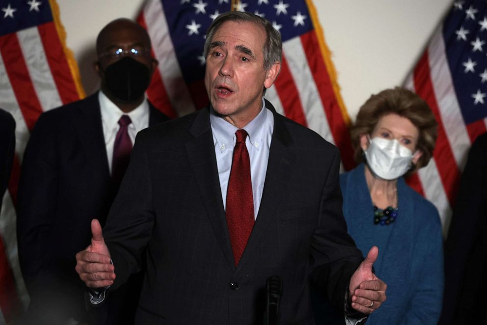 PHOTO: Sen. Jeff Merkley speaks to members of the press after a Senate Democratic Caucus meeting, Jan. 18, 2022, in Washington, D.C. 