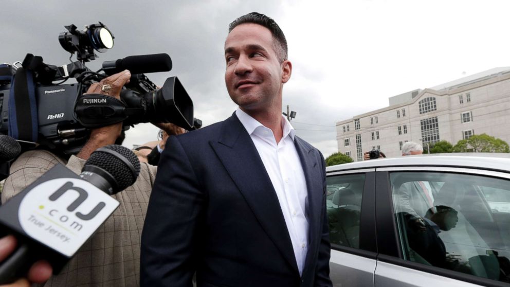 PHOTO: Reporters gather around Mike "The Situation" Sorrentino as he leaves the MLK Jr. Federal Courthouse in Newark, N.J., after a court appearance, Sept. 24, 2014. 