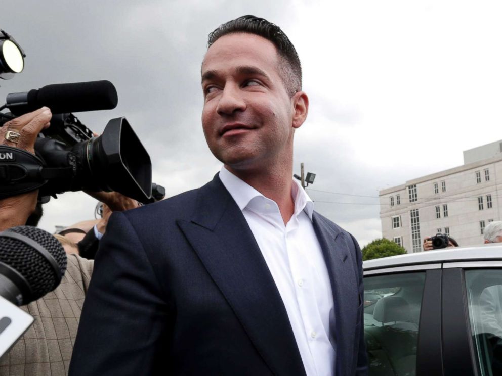 PHOTO: Reporters gather around Mike "The Situation" Sorrentino as he leaves the MLK Jr. Federal Courthouse in Newark, N.J., after a court appearance, Sept. 24, 2014. 