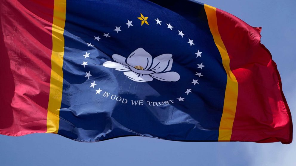 PHOTO: The magnolia centered banner chosen by the Mississippi State Flag Commission displayed outside the Old State Capitol Museum in downtown Jackson, Miss., Sept. 2, 2020. 