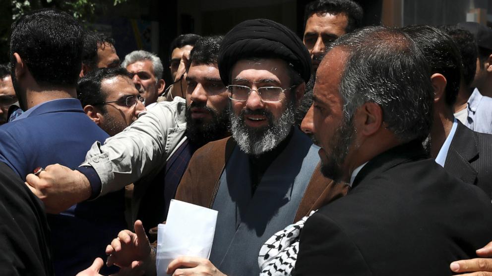 PHOTO: Mojtaba, son of Iranian Supreme Leader Ayatollah Ali Khamenei, center, attends the annual Quds, or Jerusalem Day rally in Tehran, Iran, May 31, 2019. 