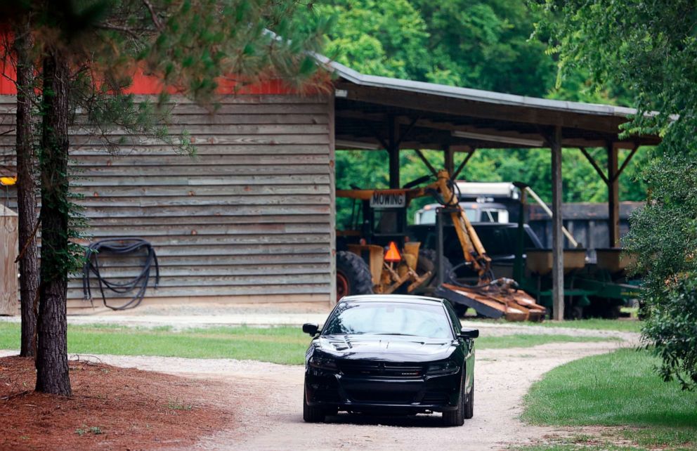 PHOTO: A vehicle sits in the driveway of a home, June 8, 2021, in rural Colleton County, near Islandton, S.C.