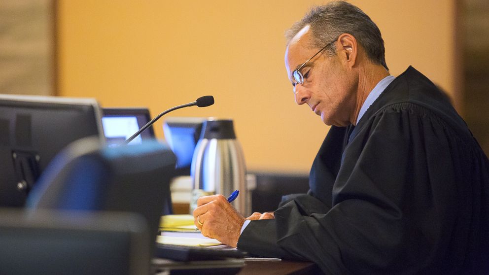 PHOTO: Judge Felix Catena takes notes during a morning of opening statements for the Oral "Nick" Hillary trial at the St. Lawrence County Courthouse in Canton, N.Y., Sept. 12, 2016.