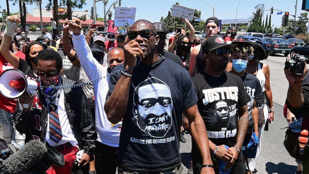 PHOTO: Former NFL wide receiver Terrell Owens leads a protest march in support of quarterback Colin Kaepernick in Inglewood, Calif., June 11, 2020.