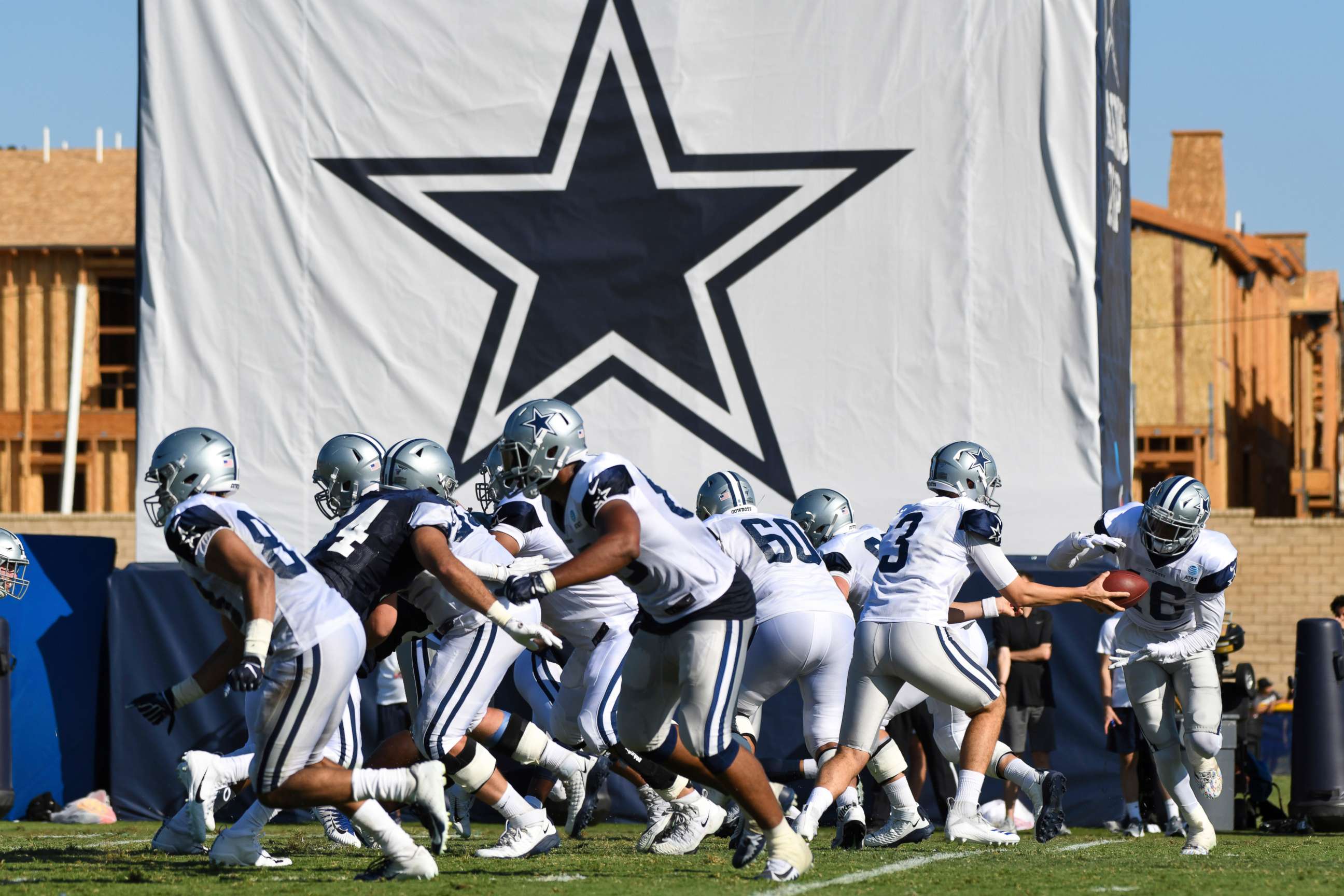 PHOTO: FILE - In this Monday, July 29, 2019, file photo, Dallas Cowboys practice at the NFL football team's training camp in Oxnard, Calif. The NFL has informed teams their training camps will open on time. 