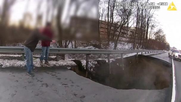 Drivers riding on Interstate 80 spotted an unexpected present the morning after last Christmas -- a sinkhole just feet away from where cars were passing by in suburban New Jersey.