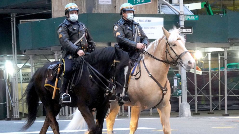 PHOTO: Two police officers from the mounted unit of NYPD are seen at 34th street on April 23, 2020 in New York City.
