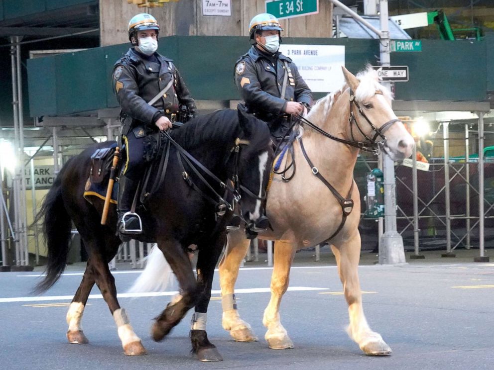 PHOTO: Two police officers from the mounted unit of NYPD are seen at 34th street on April 23, 2020 in New York City.
