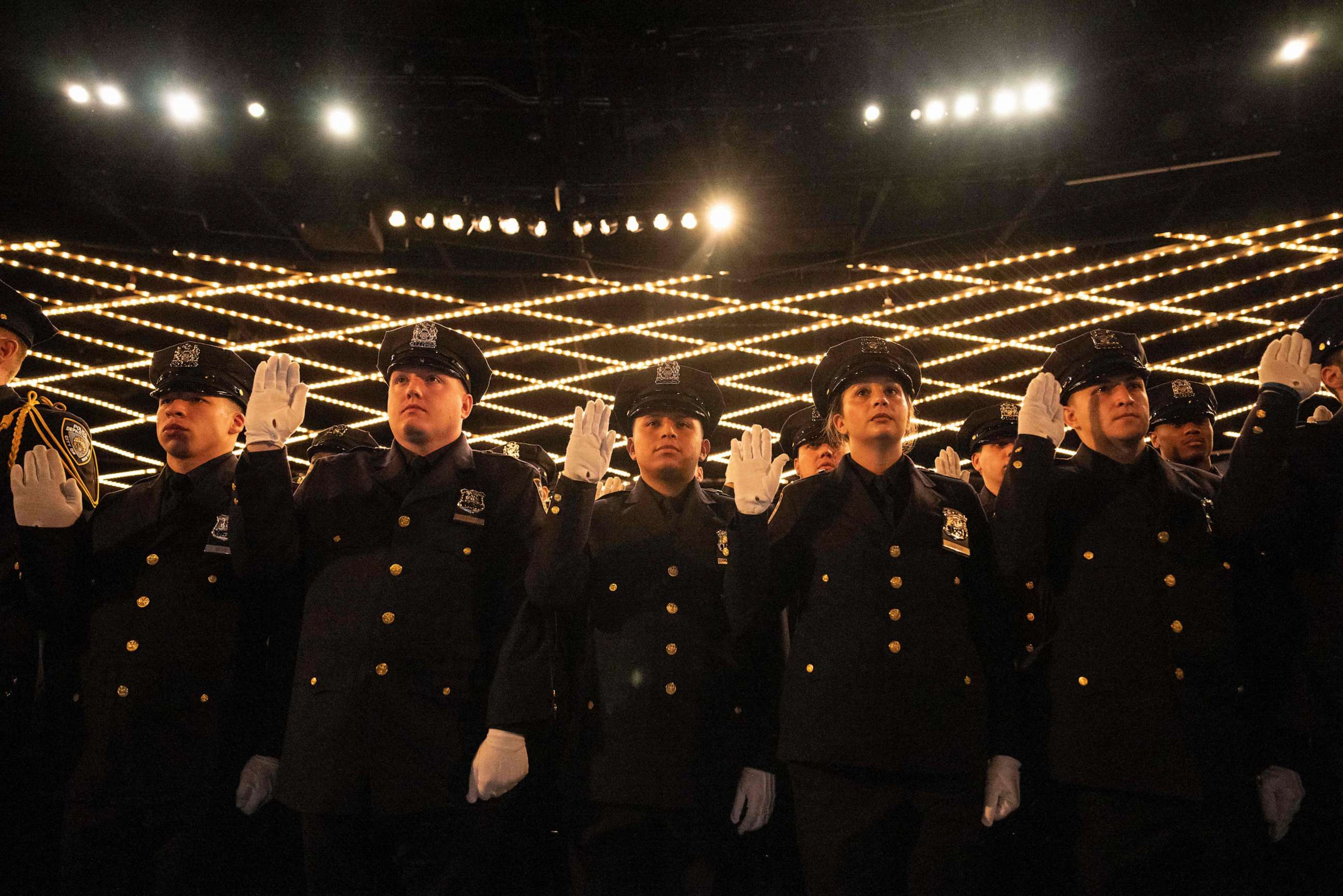PHOTO: New York City Police Academy graduates attend their graduation ceremony at Madison Square Garden on April 24, 2023 in New York.