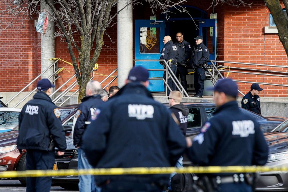 PHOTO: New York City police officers work the scene of a police involved shooting outside the 41st precinct Sunday, Feb. 9, 2020, in New York. 