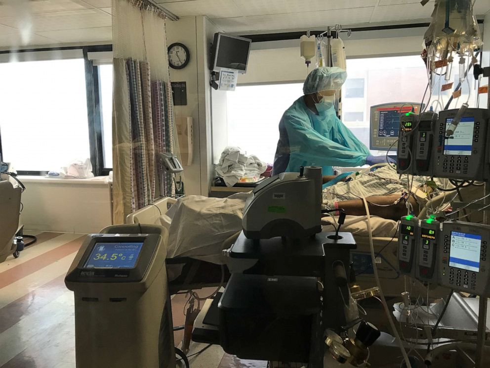 PHOTO: Manhassat, New York: Members of the medical team at Northwell Health's North Shore University Hospital care for one of the patients receiving the therapeutic hypothermia described in the article.