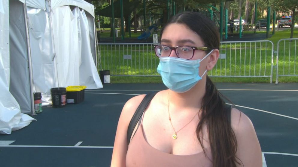 PHOTO: Natalie Choy, 16, says her entire family became ill with COVID-19. She was at a testing site in Miami Lakes, Florida, after testing positive two weeks earlier to see if the virus had passed. 