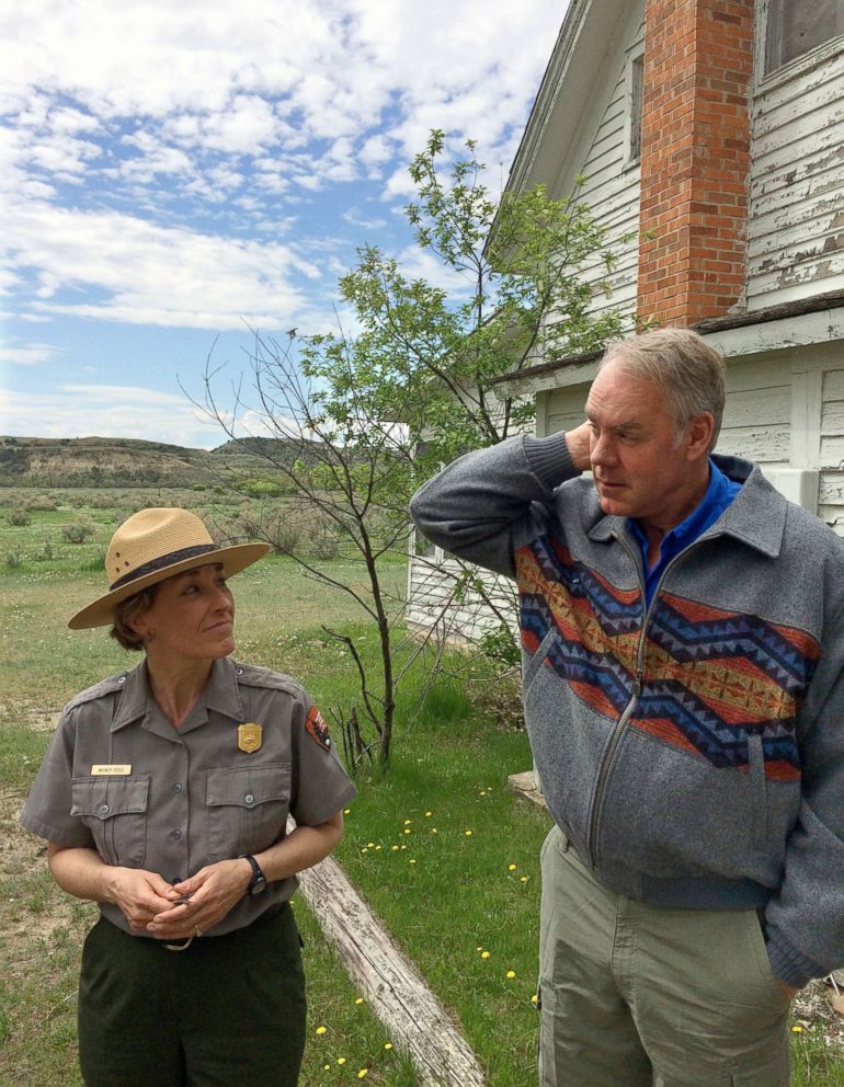 PHOTO: Interior Secretary Ryan Zinke, right, speaks with Theodore Roosevelt National Park Superintendent Wendy Ross during a visit to the park in western North Dakota on May 22, 2018.