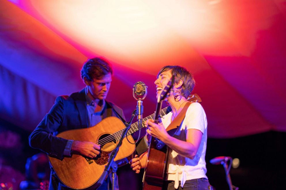 PHOTO: The Honey Dewdrops, Kagey Parrish and Laura Wortman, perform a musical set in front of an audience.