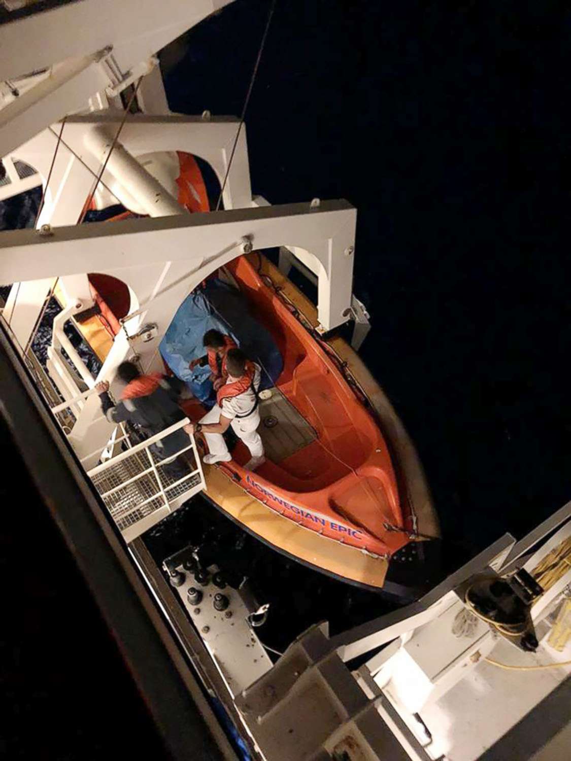 PHOTO: A lifeboat is deployed to search for a woman who was seen going overboard the Norwegian Epic on Tuesday evening, March 7, 2018, in the Bahamas.