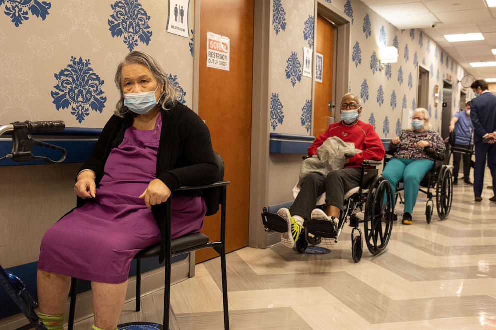 PHOTO: Nursing home residents wait in line to receive a COVID-19 vaccine at Harlem Center for Nursing and Rehabilitation, a nursing home facility, Jan. 15, 2021 in Harlem neighborhood of New York. 